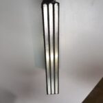 A cross-section view of a laminated bearing, showing the alternating layers of steel and elastomer.