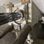 A close-up of a multi-strand anchorage after the tensioning process